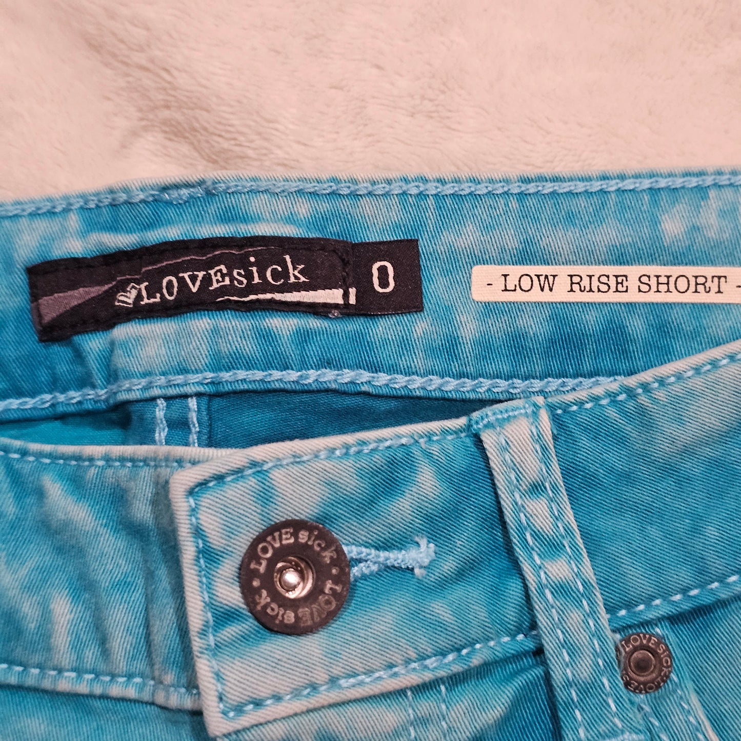 Turquoise Acid Wash Jean Shorts | Skull Rivets Low Rise Raw Hem - Lovesick - Shorts
