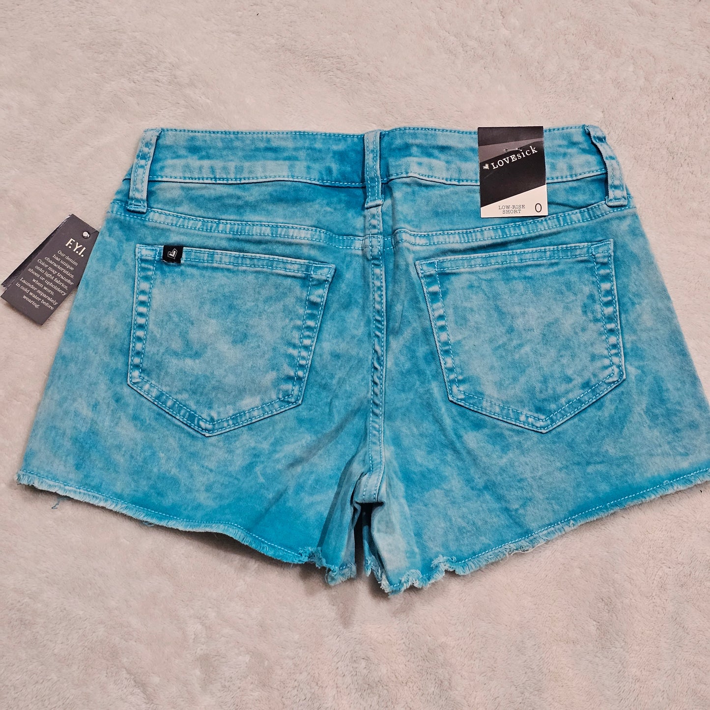 Turquoise Acid Wash Jean Shorts | Skull Rivets Low Rise Raw Hem - Lovesick - Shorts